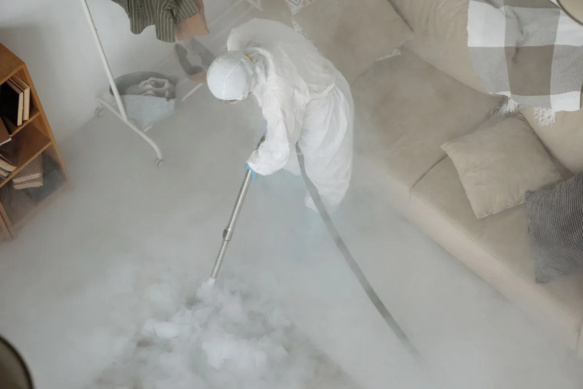 Biohazard cleanup technician in protective equipment, Soperton, GA